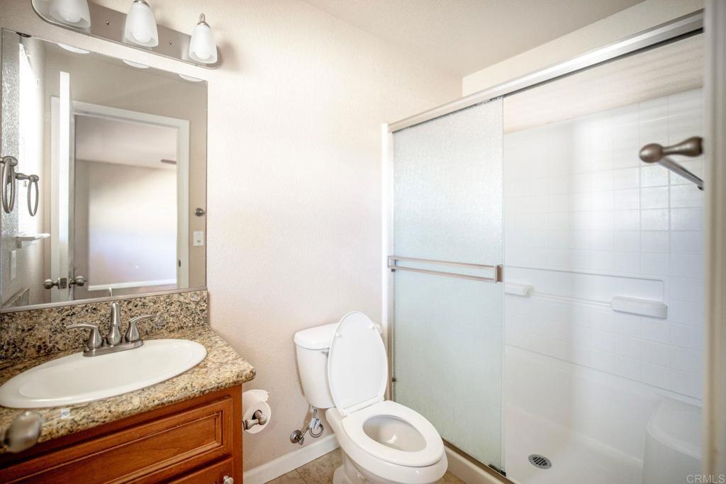 4990 Del Road Loomis, CA 95650 - Photo 17 of 22 a bathroom with a sink a toilet and shower