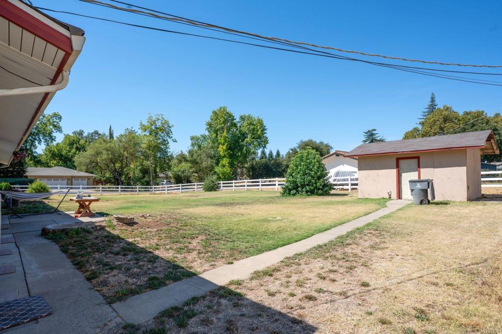 4990 Del Road Loomis, CA 95650 - Photo 19 of 22 a view of a house with a yard