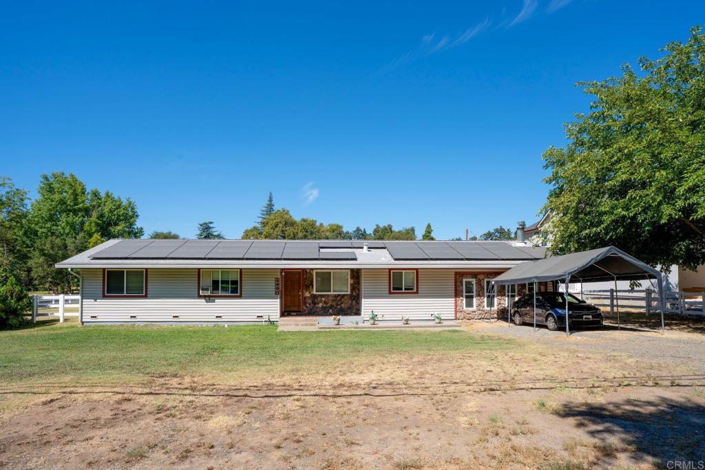 4990 Del Road Loomis, CA 95650 - Photo 4 of 22 front view of a house with a yard