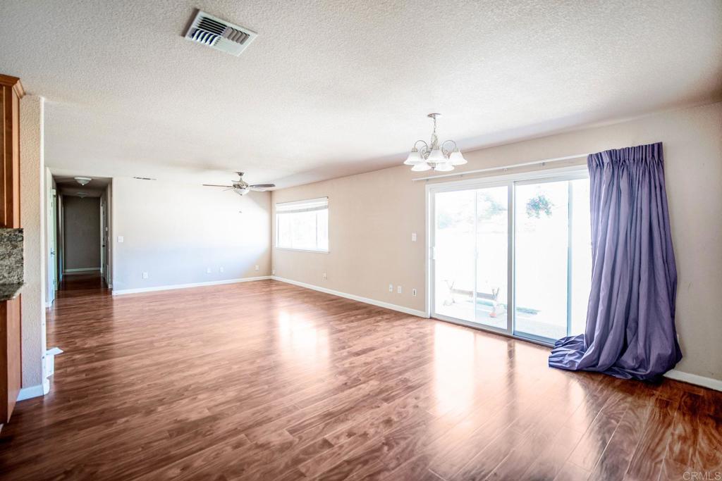 4990 Del Road Loomis, CA 95650 - Photo 8 of 22 a view of a room with wooden floor and large window