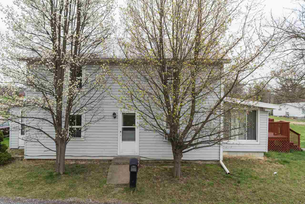 10572 Cook Town Road Bridgewater, VA 22812 - Photo 2 of 24 a white house that has a tree in front of it