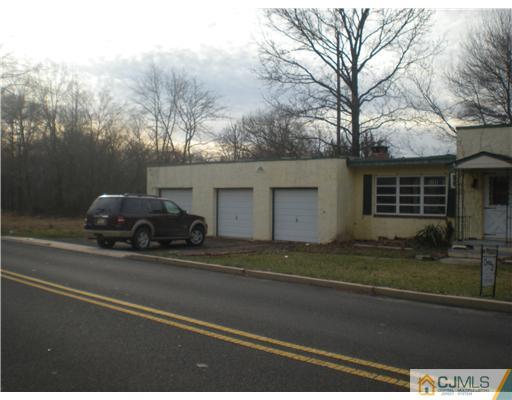 220 Gordon Road Old Bridge, NJ 07747 - Photo 2 of 9 a view of a car parked in front of a house