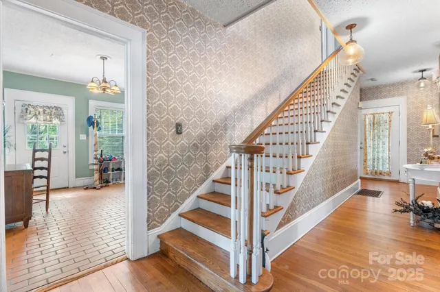 a bedroom with a bed and a fireplace