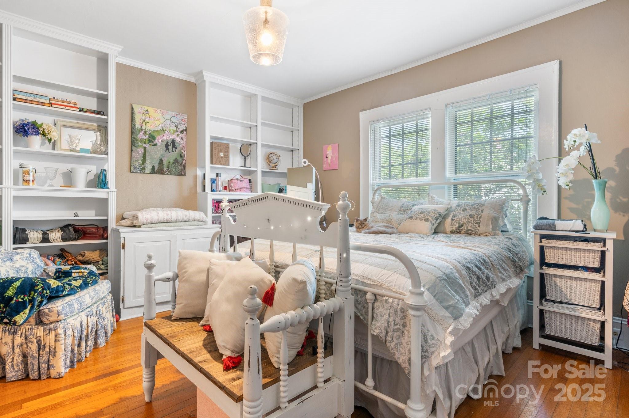 313 East Main Street Morganton, NC 28655 - Photo 18 of 48 a bedroom with furniture and a window