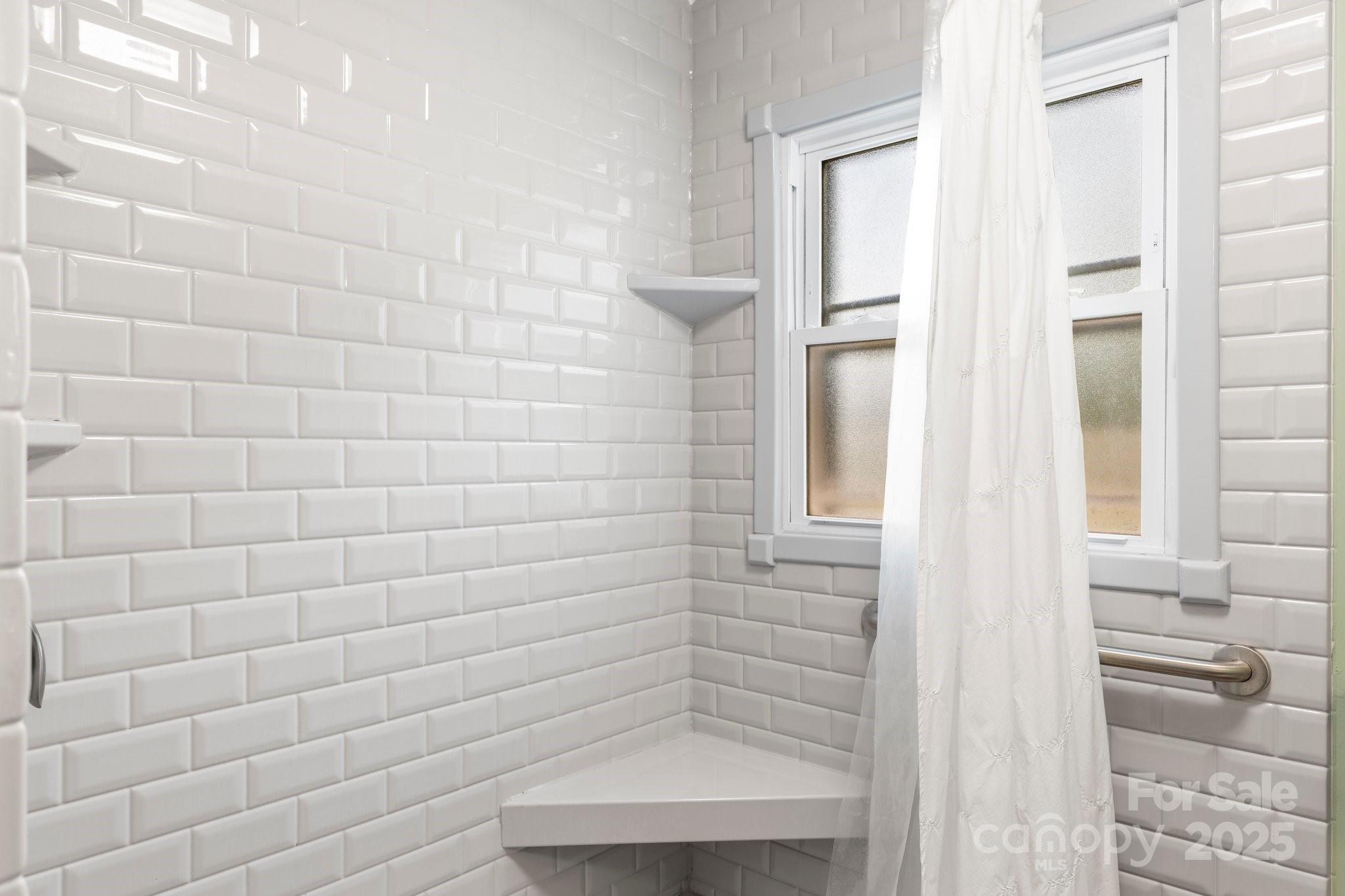 313 East Main Street Morganton, NC 28655 - Photo 25 of 48 a bathroom with a shower