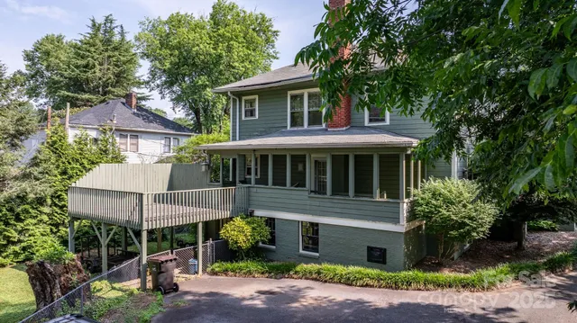 a view of a garden with a tree