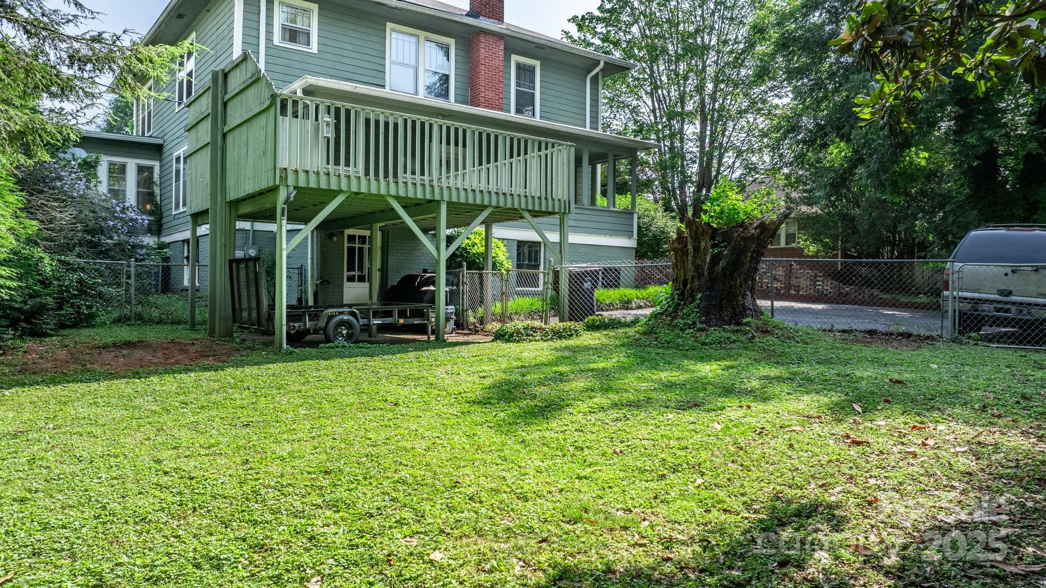 313 East Main Street Morganton, NC 28655 - Photo 40 of 48 a front view of a house with garden