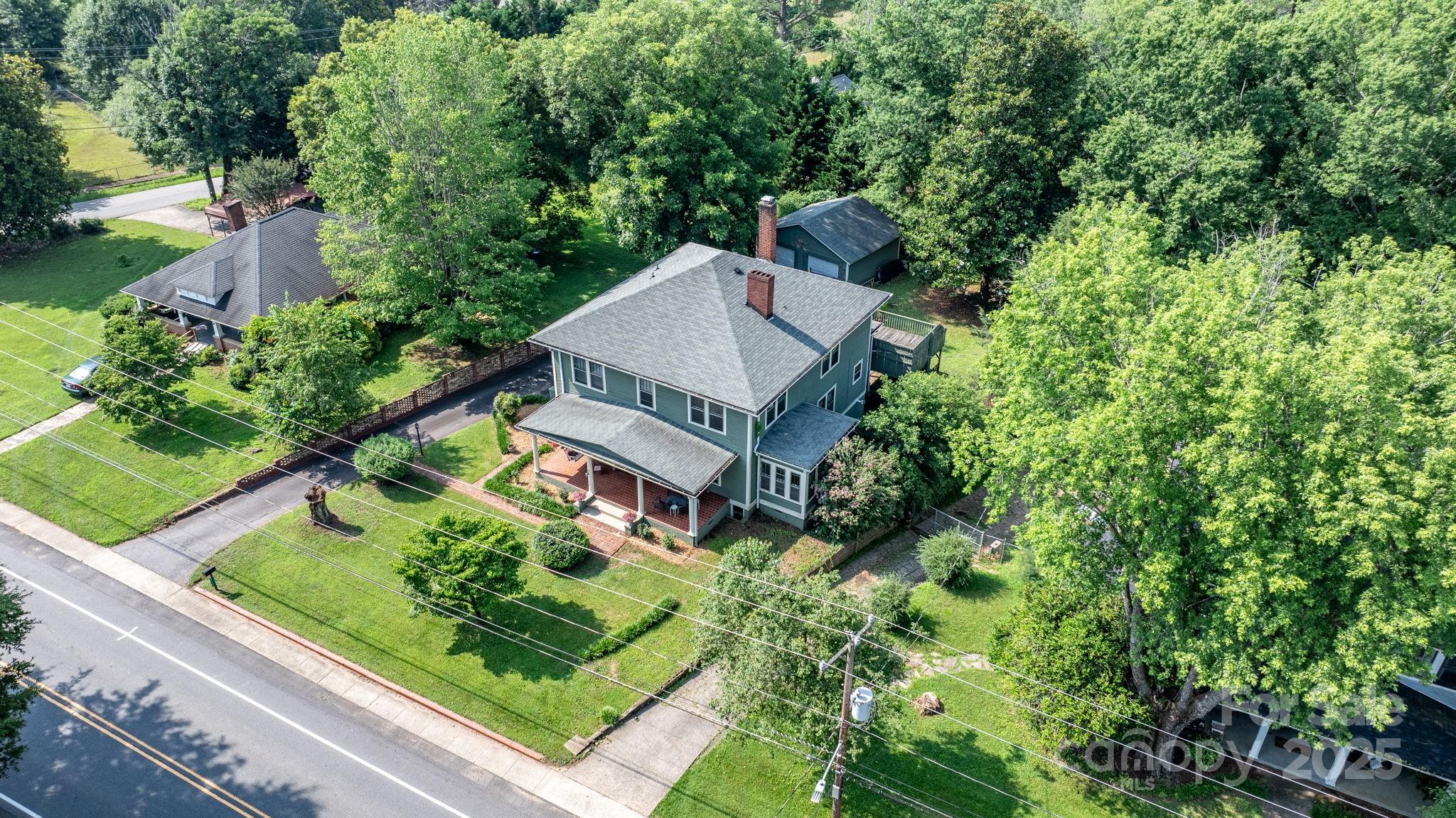 313 East Main Street Morganton, NC 28655 - Photo 42 of 48 an aerial view of a house with a garden