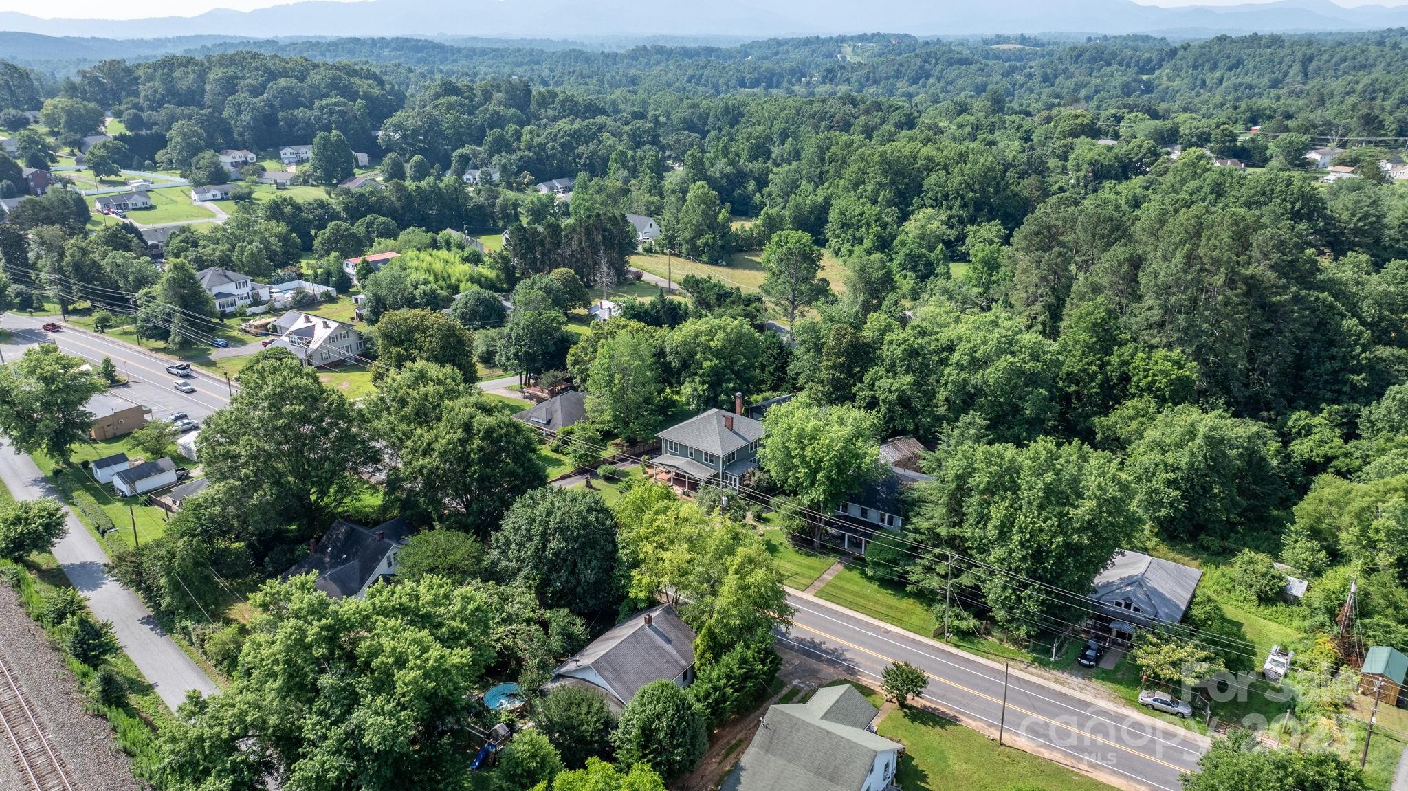 313 East Main Street Morganton, NC 28655 - Photo 48 of 48 an aerial view of a house with a yard