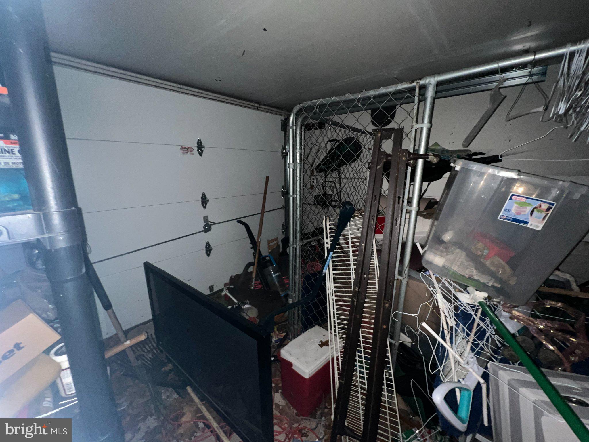 1346 Clarke Road Abington, PA 19001 - Photo 13 of 28 Cluttered garage in need of organization.