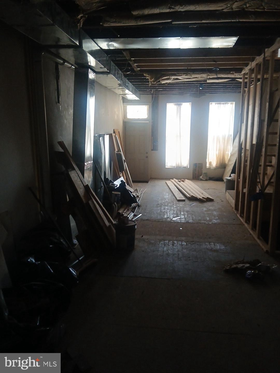 2932 Greenmount Avenue Baltimore, MD 21218 - Photo 2 of 15 a view of empty room with wooden floor