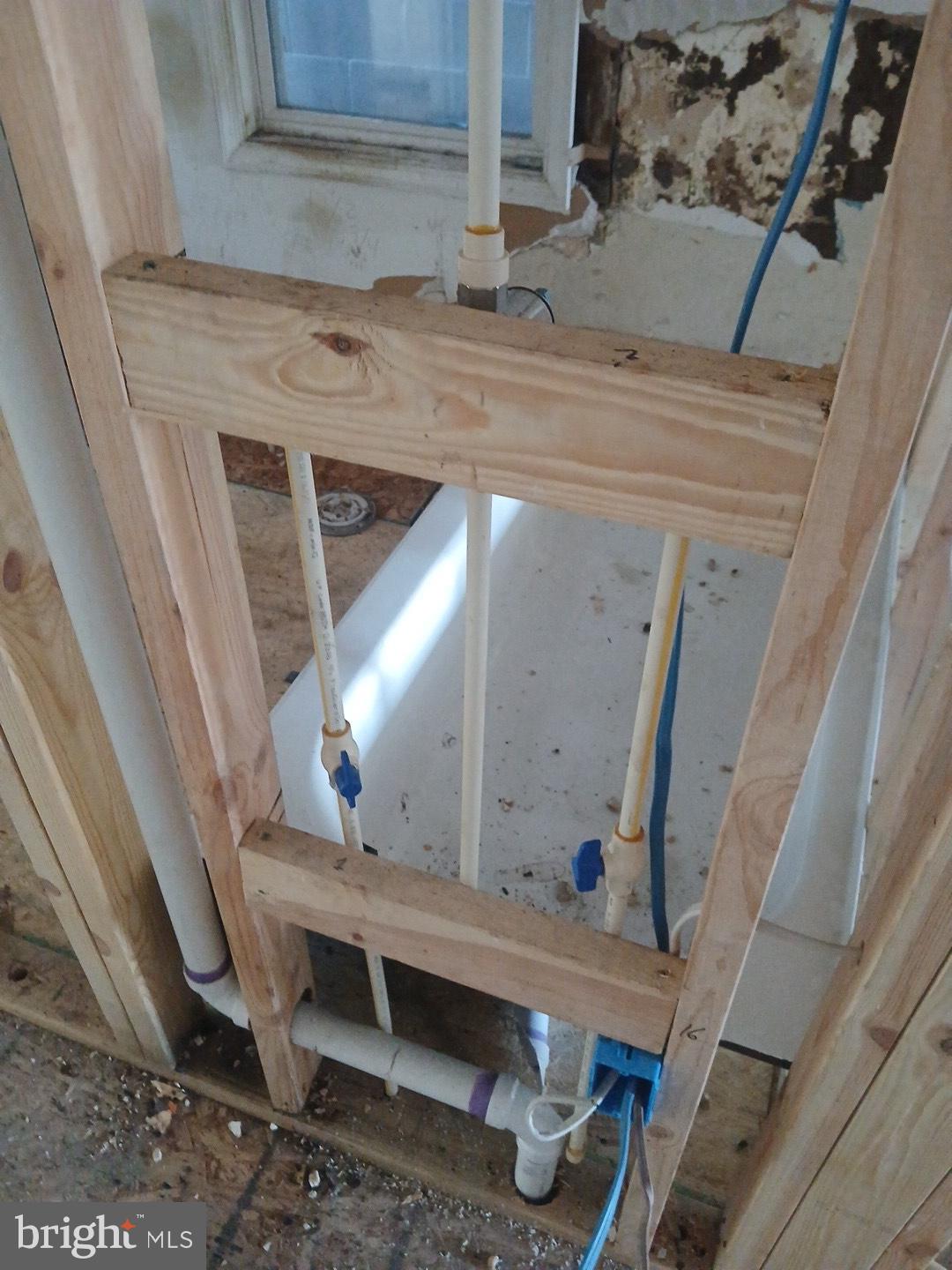 2932 Greenmount Avenue Baltimore, MD 21218 - Photo 3 of 15 a view of staircase with a rug