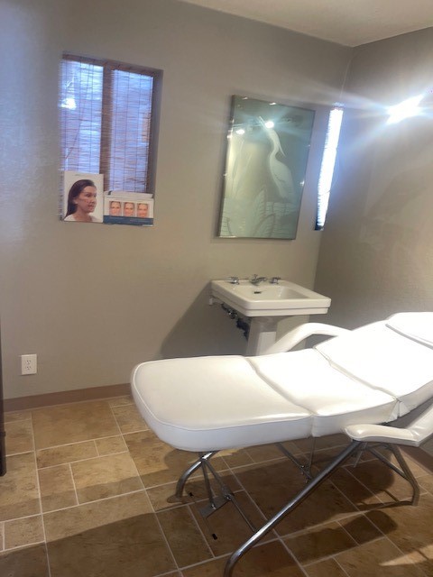 24460 Hawthorne Boulevard Torrance, CA 90505 - Photo 5 of 6 a bathroom with a sink mirror and vanity