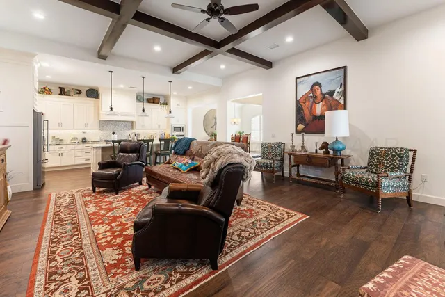 a living room with furniture or couch and a rug