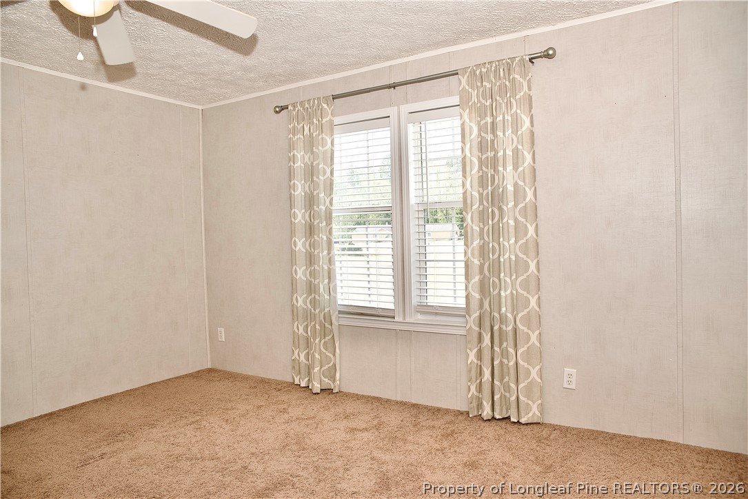 1071 Watts Road Lumberton, NC 28360 - Photo 23 of 31 a view of an empty room with a window