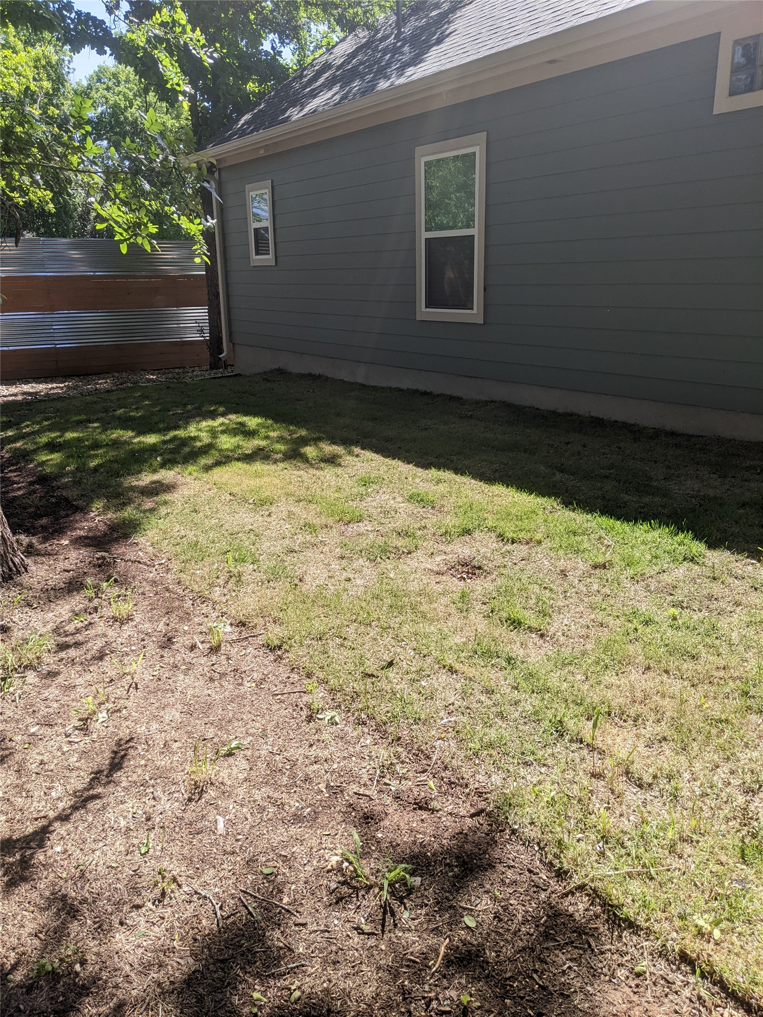 906 Kate Street, Unit A Lockhart, TX 78644 - Photo 12 of 15 View of grassy yard for gardening , dogs area, or entertaining