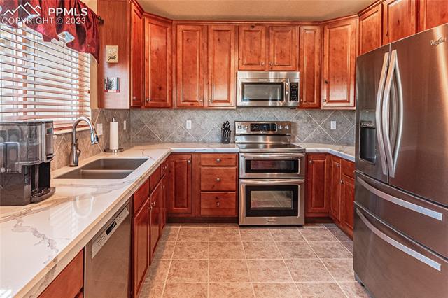 9848 Rockingham Drive Peyton, CO 80831 - Photo 7 of 50 Gallery Image 7