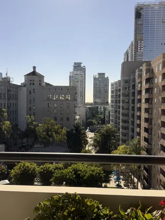 a view of a city and tall buildings