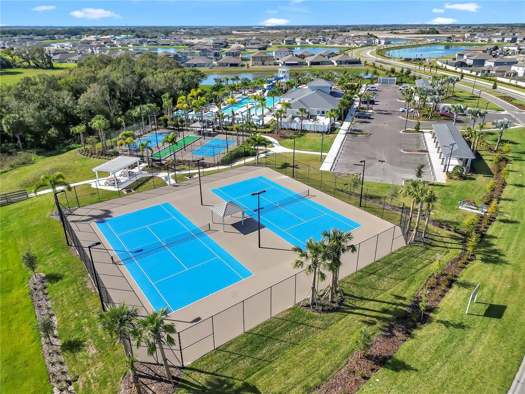 12408 Crystal Jade Way Parrish, FL 34219 - Photo 32 of 51 an aerial view of residential houses with outdoor space