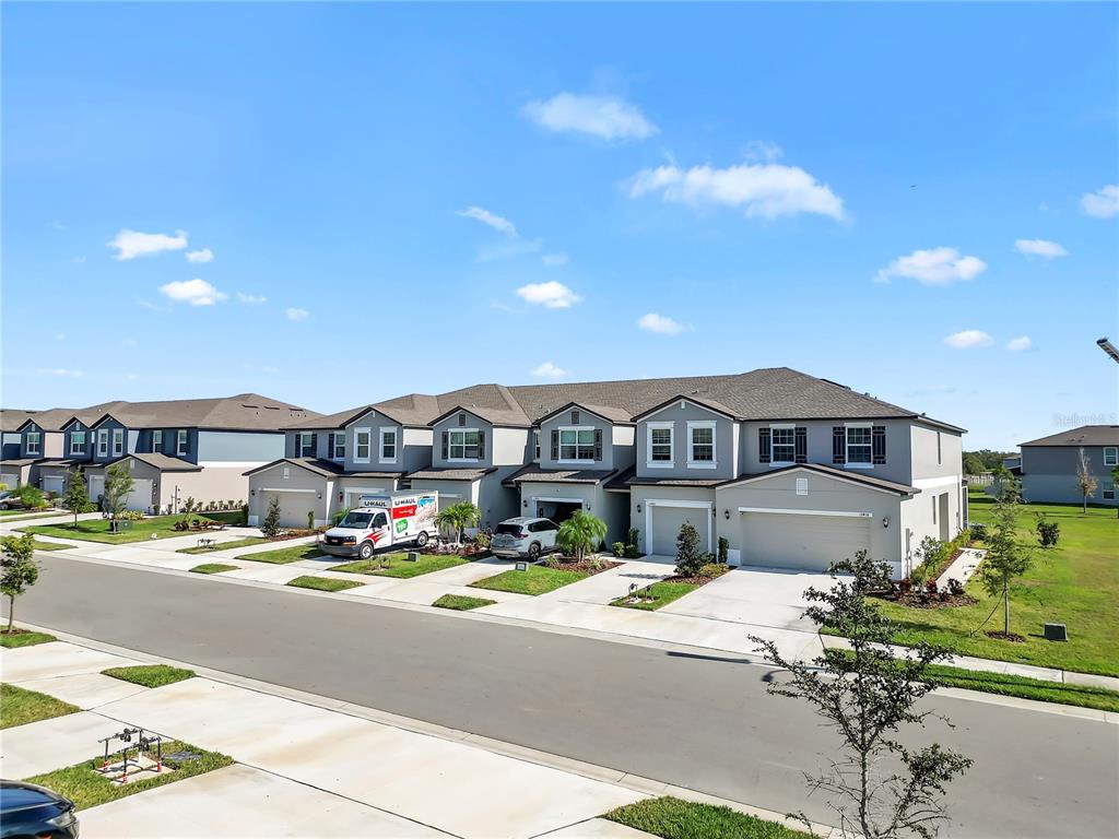 12408 Crystal Jade Way Parrish, FL 34219 - Photo 35 of 51 a front view of a house with a yard