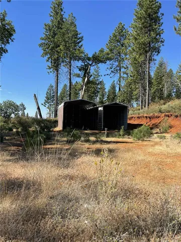 a view of a backyard of a house