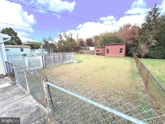 a balcony with table and chairs