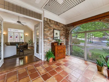 a lobby with furniture and garden