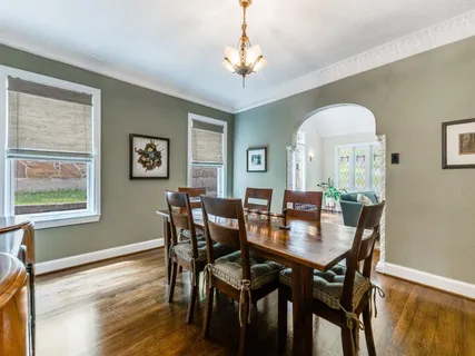 a kitchen with stainless steel appliances granite countertop a stove and a refrigerator