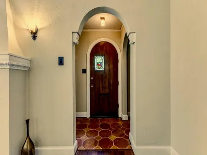 a view of a door with wooden door
