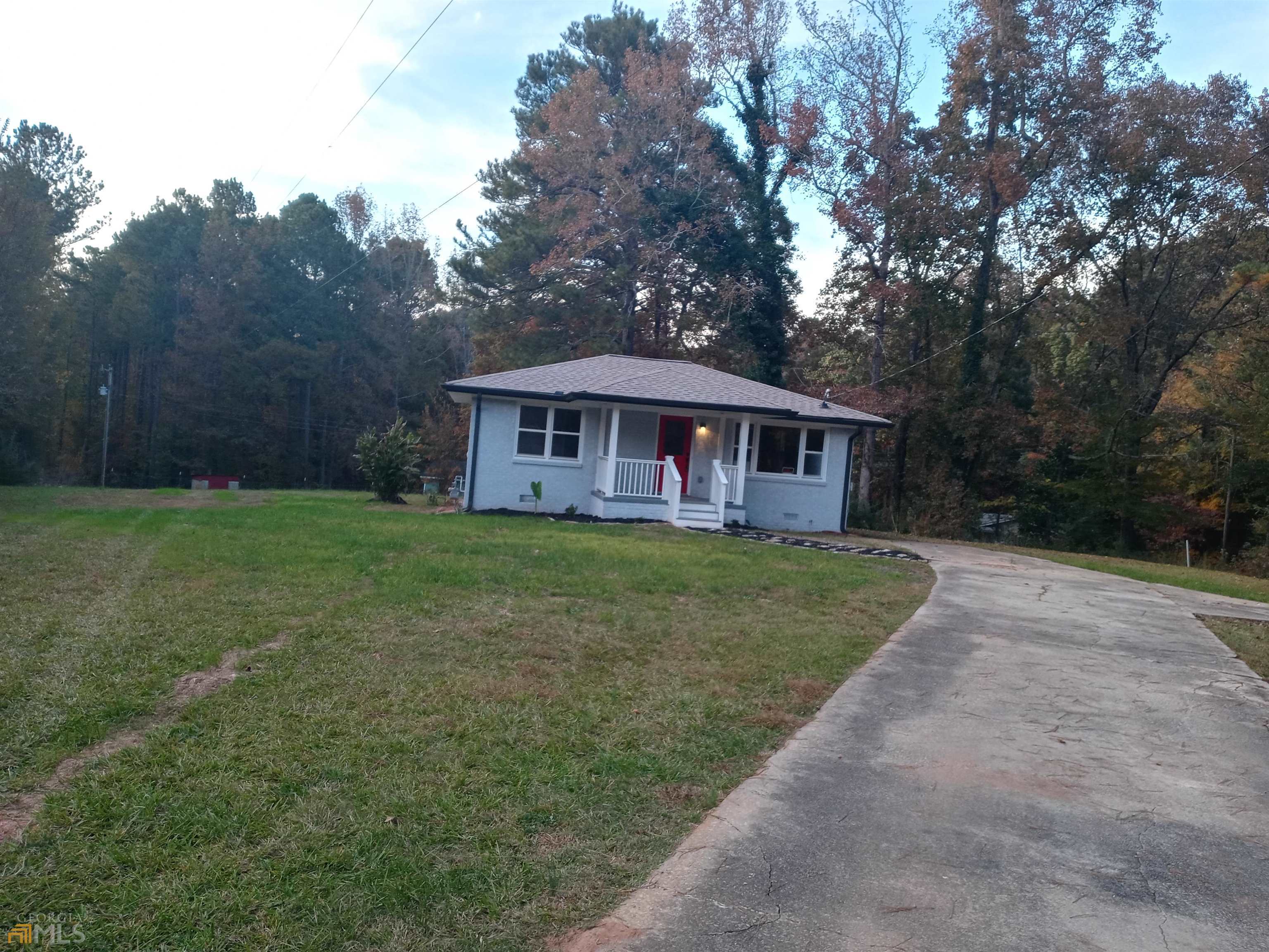 527 Ward Road Ellenwood, GA 30294 - Photo 1 of 1 a view of a house with a yard