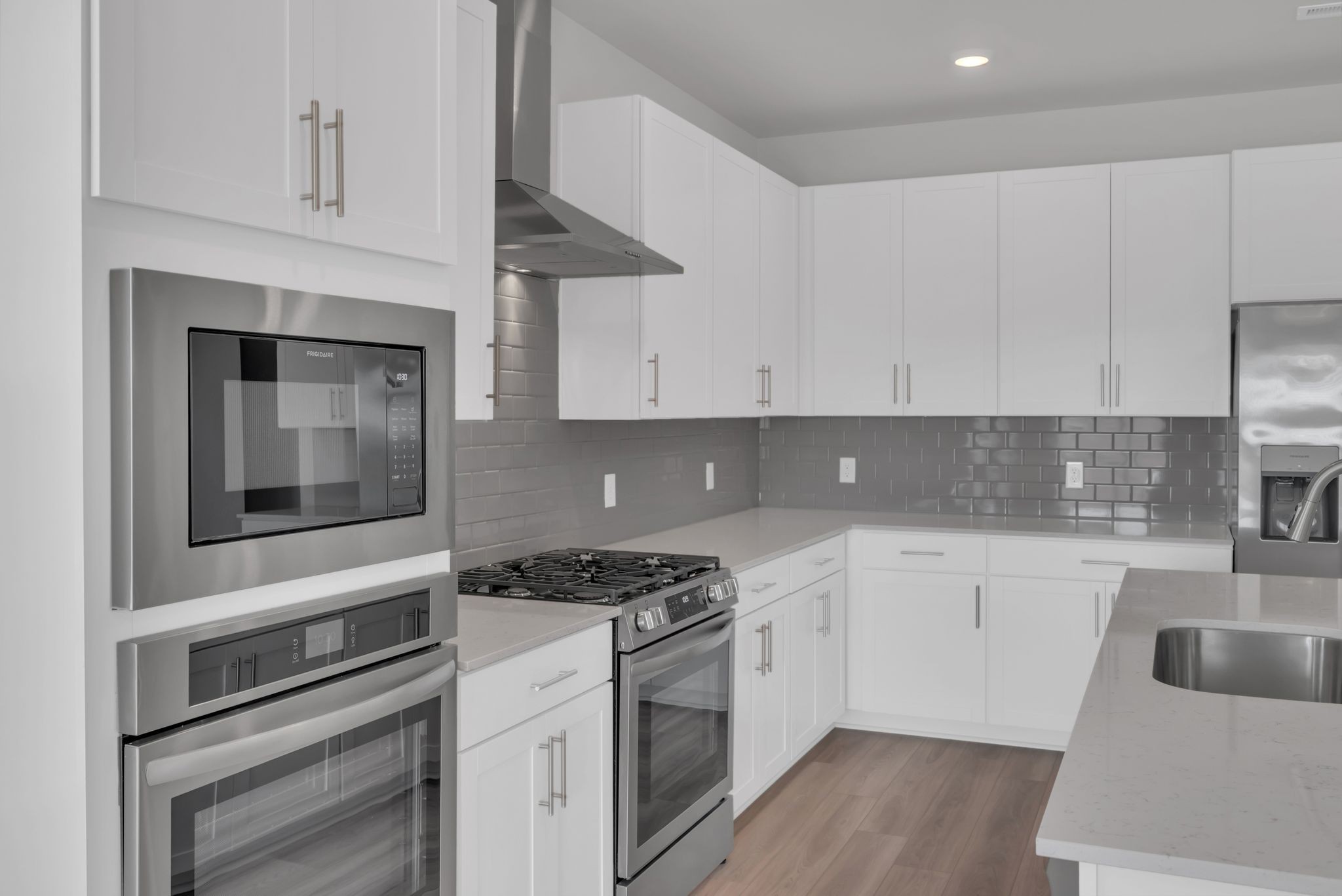 1300 Branch Street Lebanon, TN 37087 - Photo 18 of 43 a kitchen with granite countertop white cabinets and white appliances
