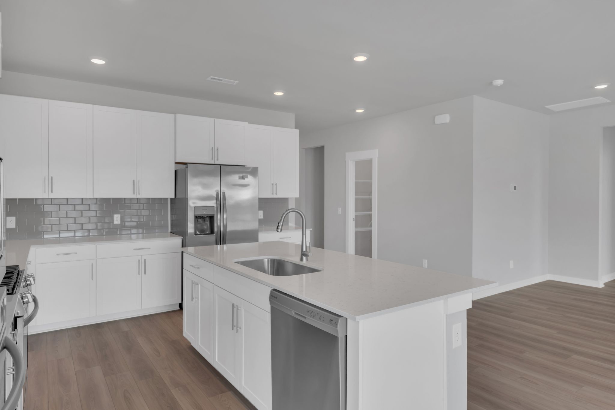 1300 Branch Street Lebanon, TN 37087 - Photo 19 of 43 a kitchen with a sink white cabinets and stainless steel appliances