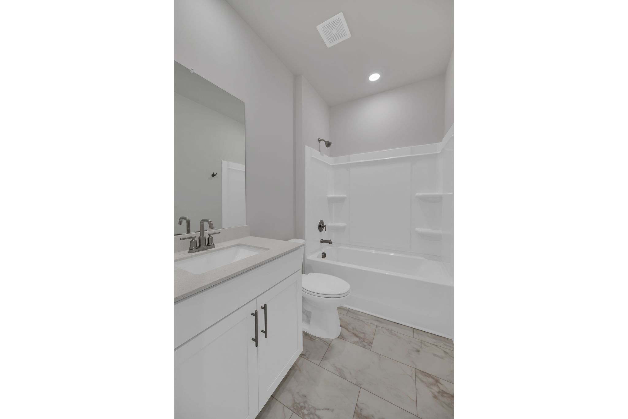 1300 Branch Street Lebanon, TN 37087 - Photo 8 of 43 a bathroom with a granite countertop sink a toilet and shower