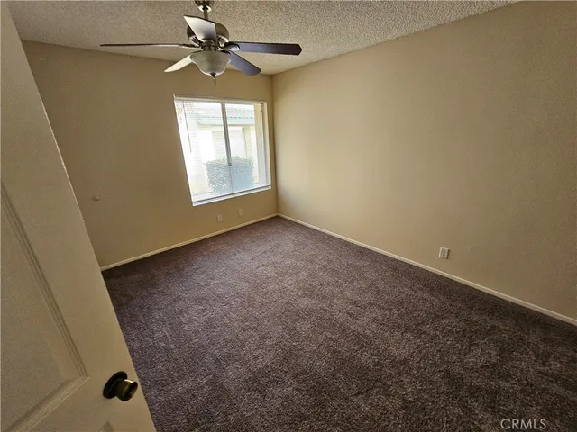 a view of a hallway with a glass door