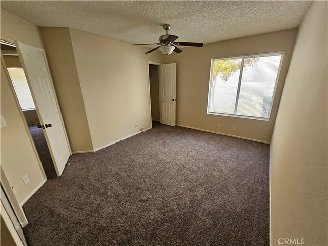 a bathroom with a sink a mirror and shower