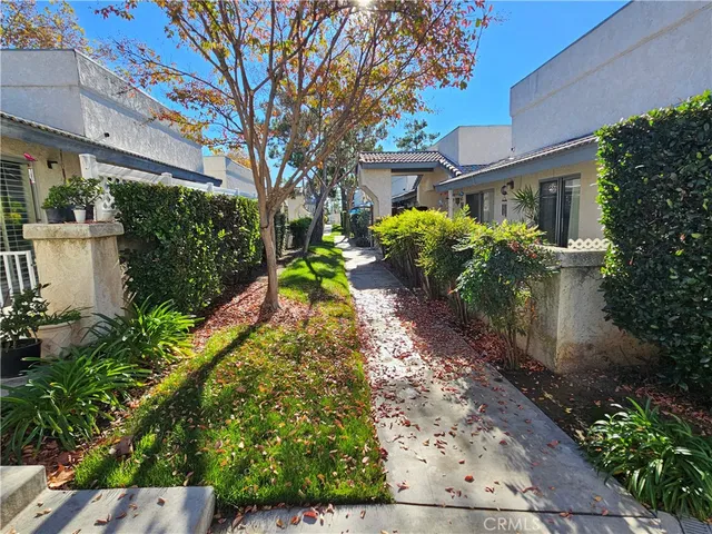 a view of a house with a street