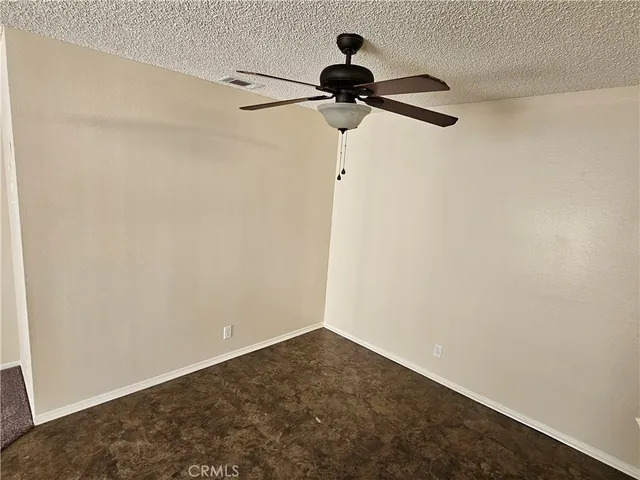 a view of a room with a fan