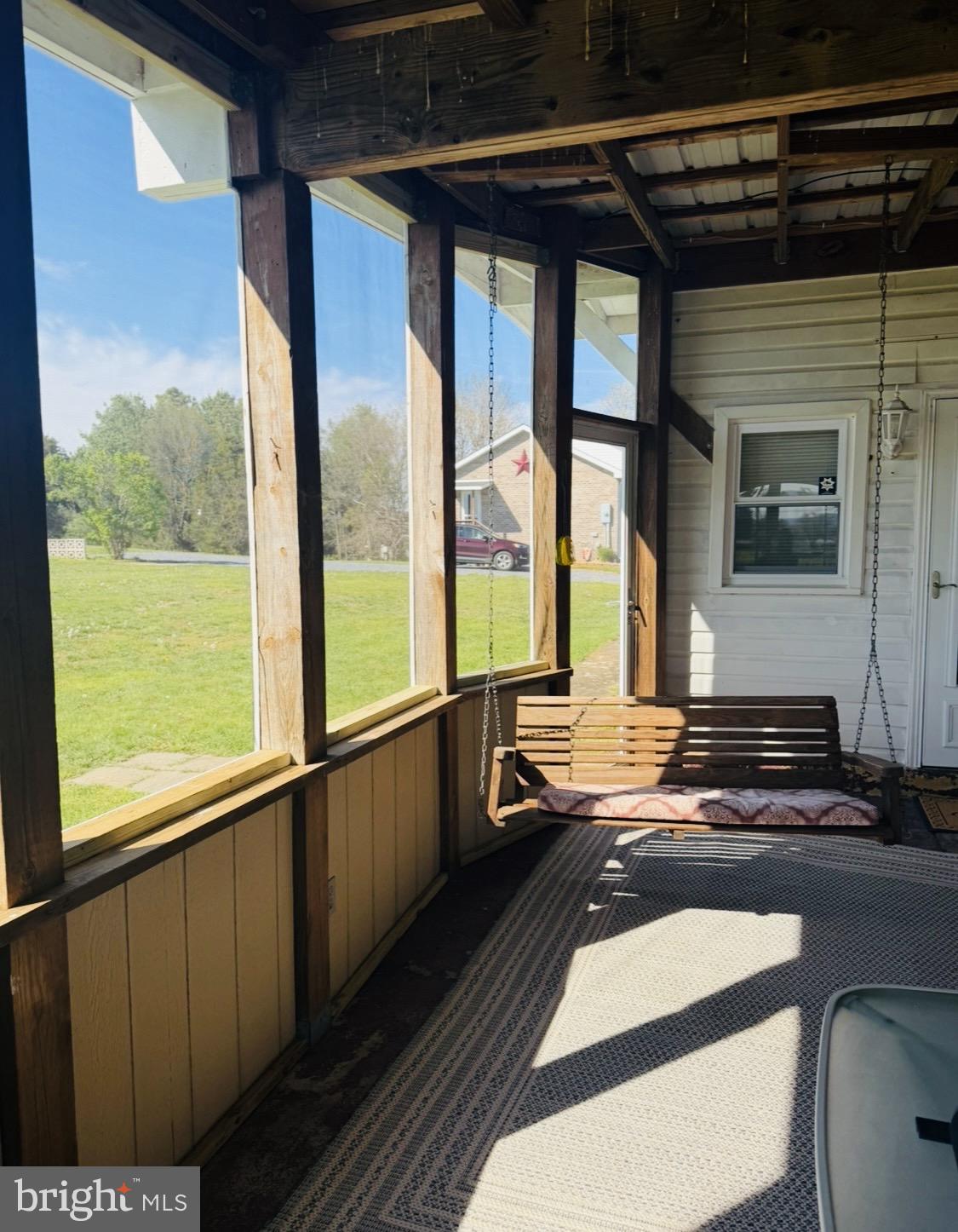1692 Mill Creek Road Luray, VA 22835 - Photo 2 of 5 a view of a balcony with wooden floor and outdoor space