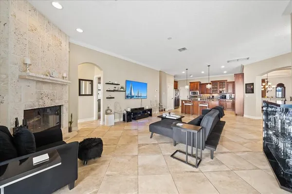 a bathroom with a granite countertop sink a toilet and a bathtub