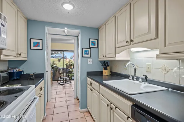 $427,500 | 130 Salter Path Road, Unit B9, Pine Knoll Shores, NC 28512