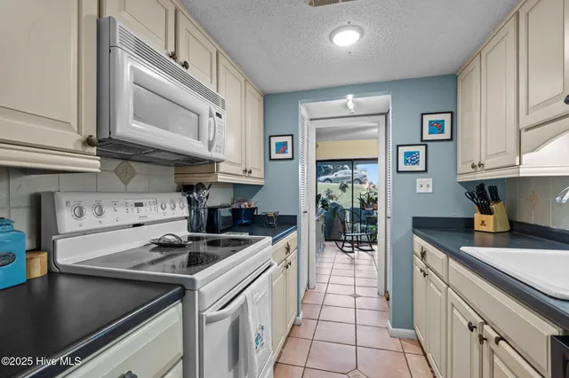 $427,500 | 130 Salter Path Road, Unit B9, Pine Knoll Shores, NC 28512