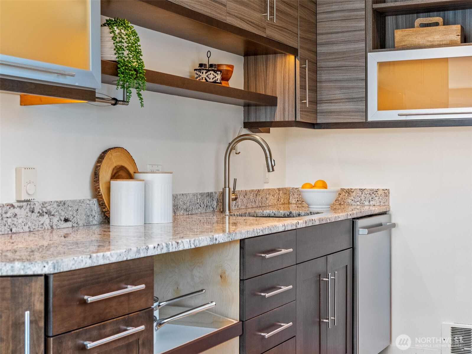 65 Kirkland Avenue, Unit 201 Kirkland, WA 98033 - Photo 12 of 35 a kitchen with a sink a counter space and a window