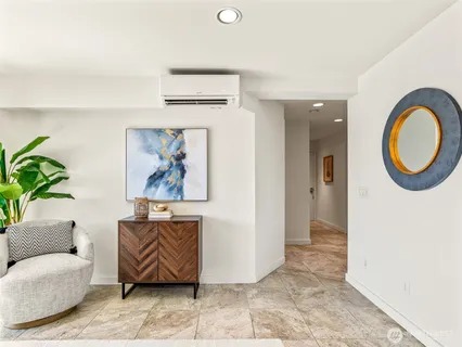 a view of a livingroom with furniture and front door