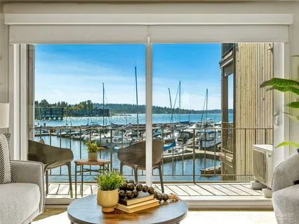 a view of a living room and kitchen view