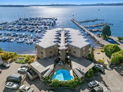 an aerial view of a house with a ocean view