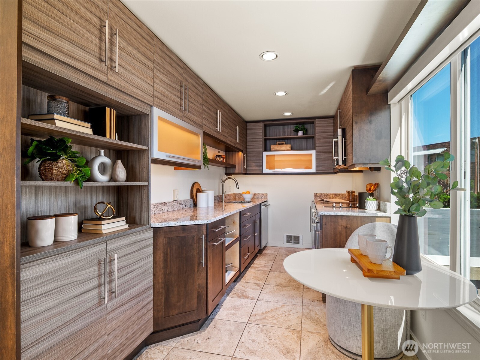 65 Kirkland Avenue, Unit 201 Kirkland, WA 98033 - Photo 10 of 35 a kitchen with a stove a refrigerator and a wooden cabinets