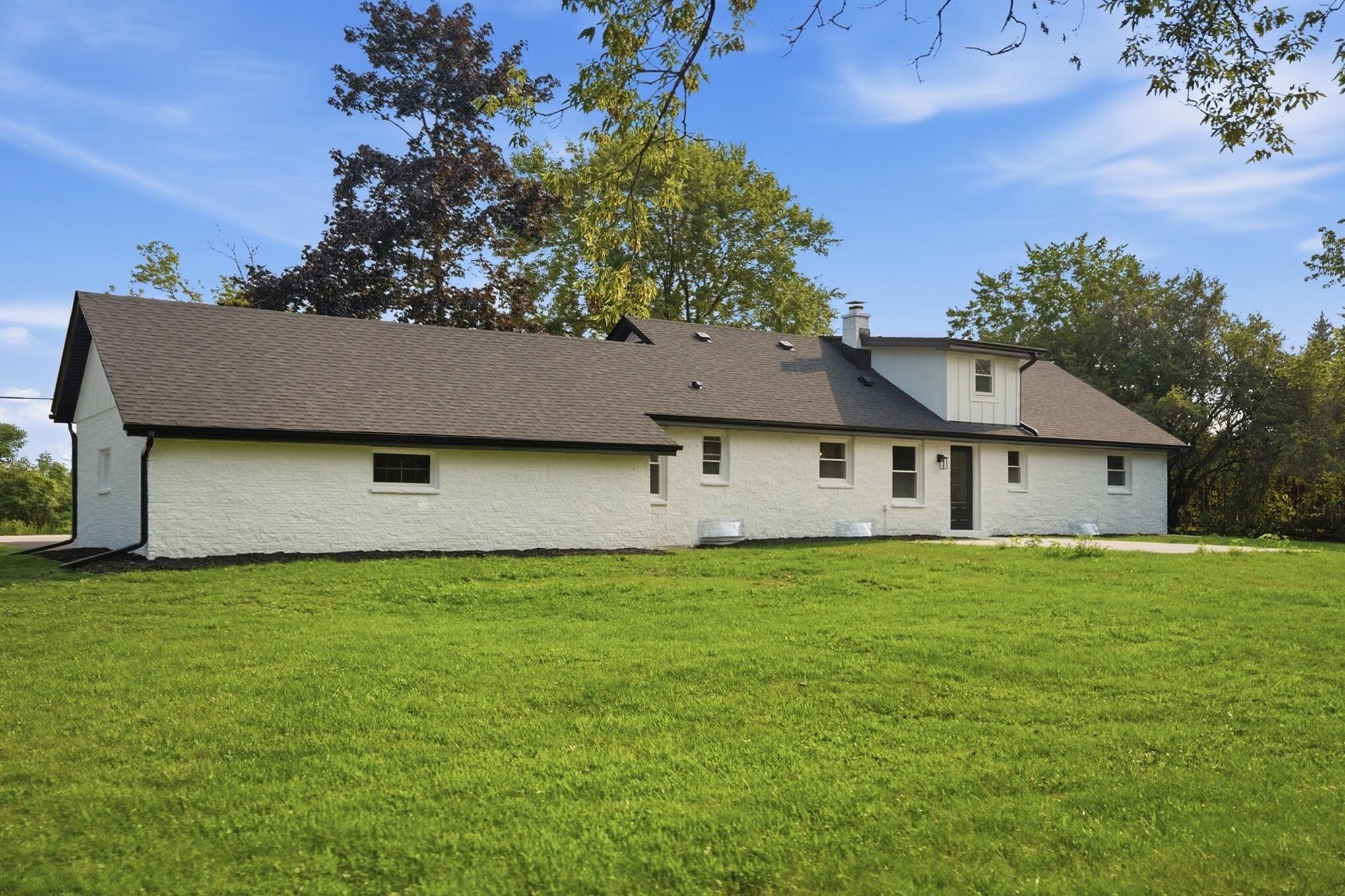 7526 West County Line Road Mequon, WI 53092 - Photo 68 of 72 68_Rear_Yard_View_2