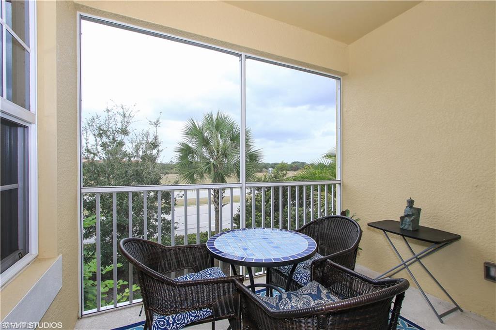 8540 Violeta Street, Unit 202 Estero, FL 34135 - Photo 19 of 22 a view of a chair and table in the balcony