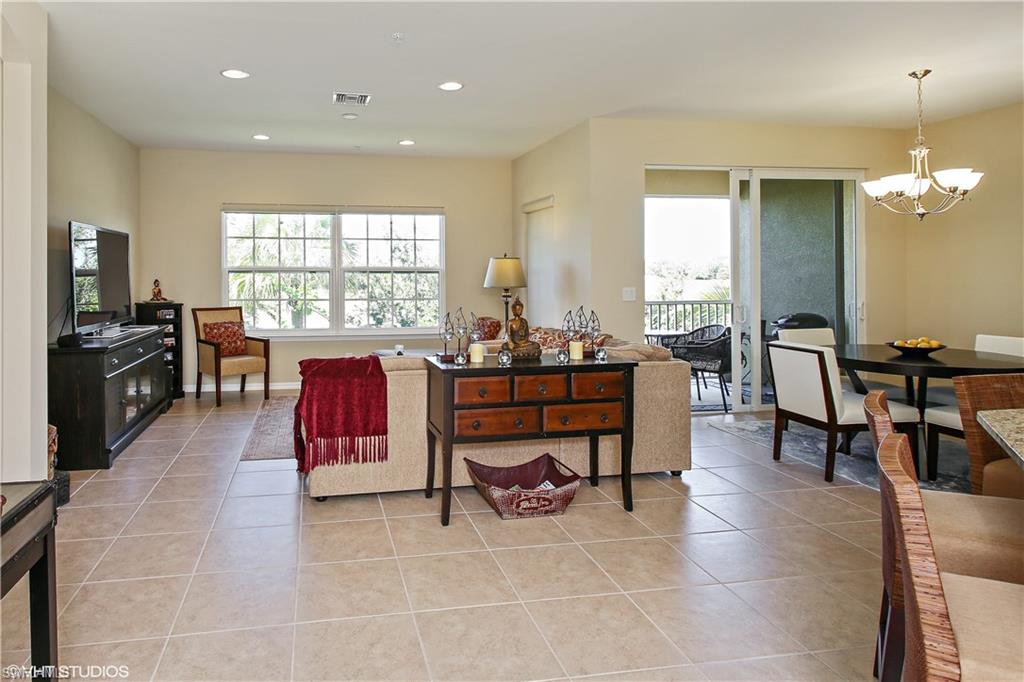 8540 Violeta Street, Unit 202 Estero, FL 34135 - Photo 4 of 22 a view of a dining room with furniture