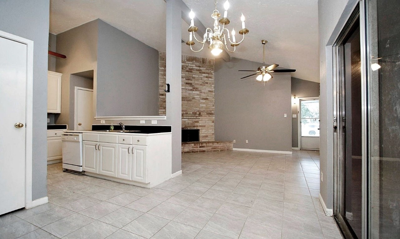 3111 Oak Rock Spring, TX 77373 - Photo 8 of 21 a view of a kitchen with cabinet and an empty room